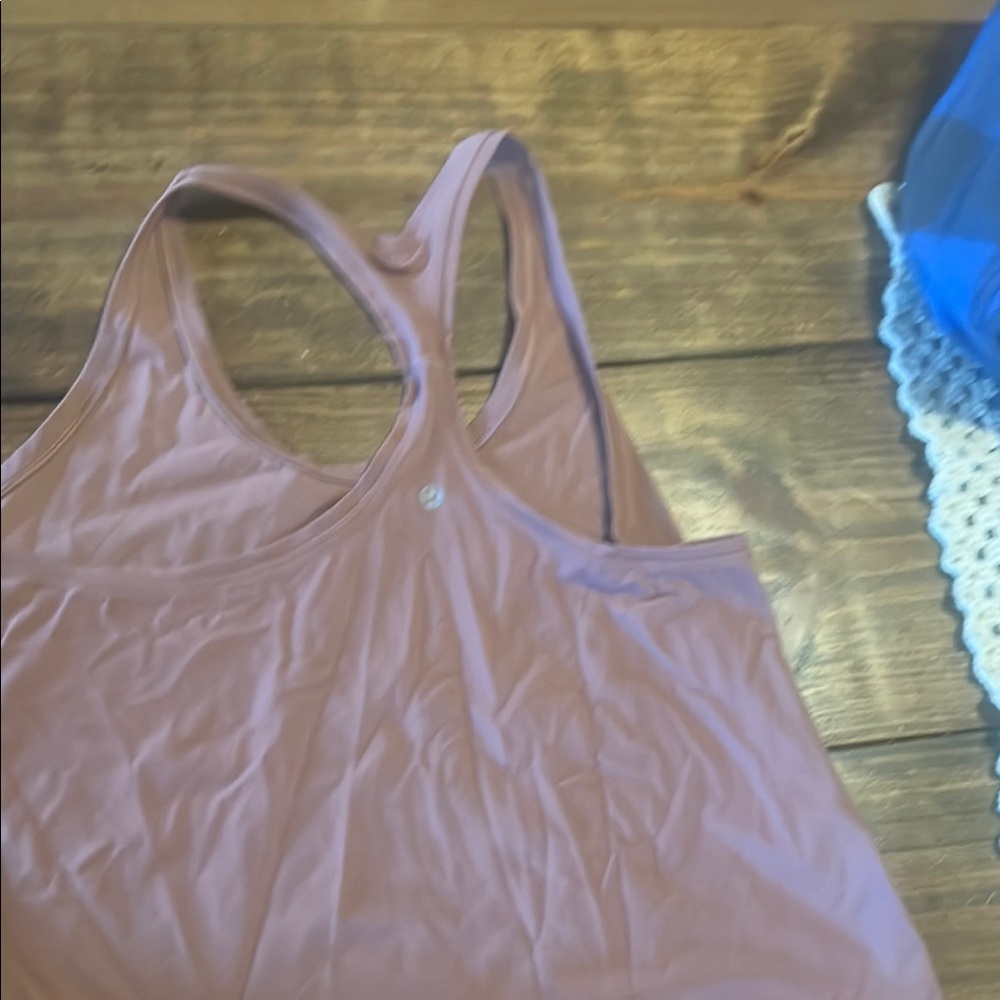 Pink Lululemon workout tank top